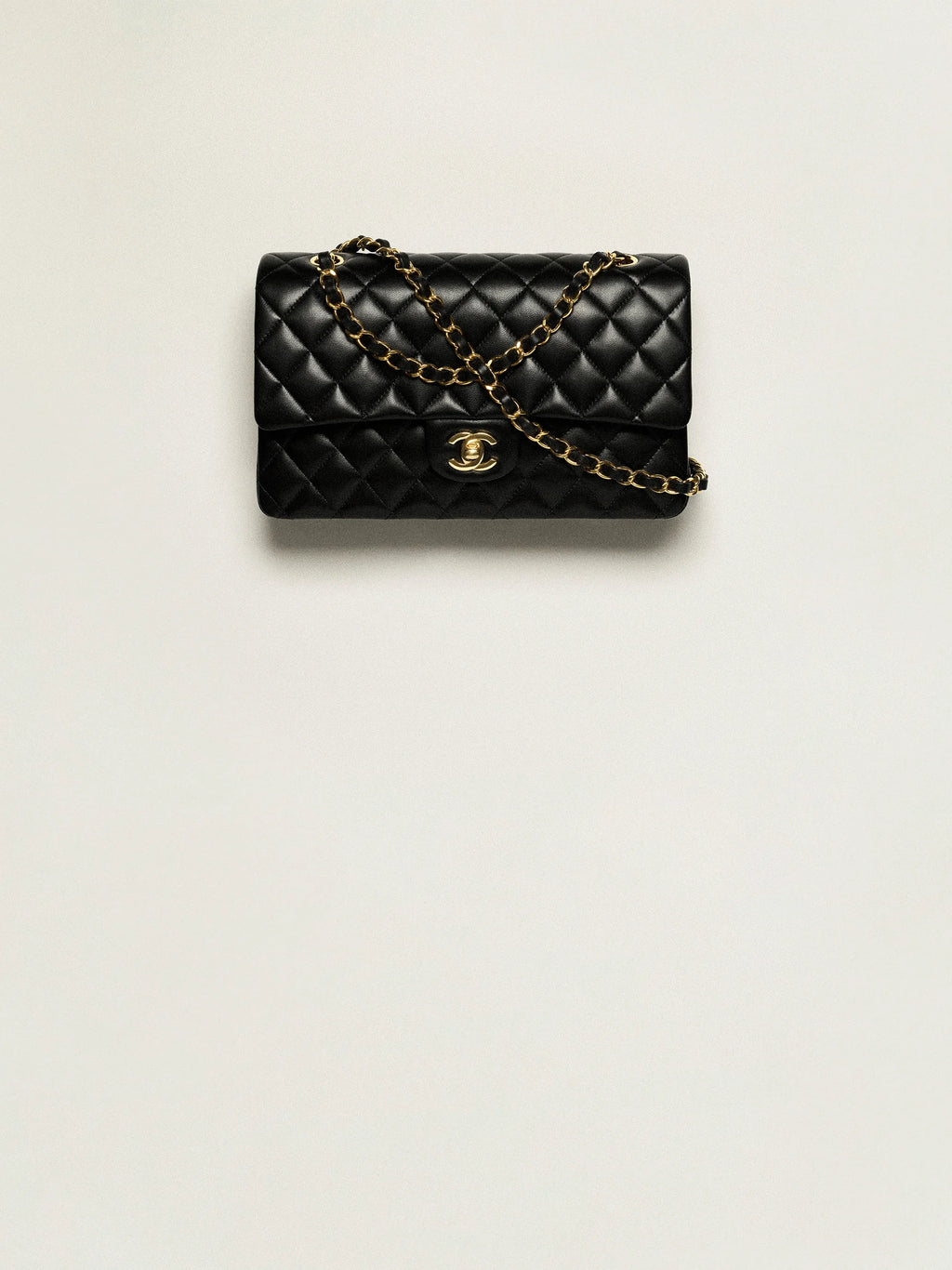 Chanel Classic Handbag
 
Grained Calfskin & Gold-Tone Metal 
Black