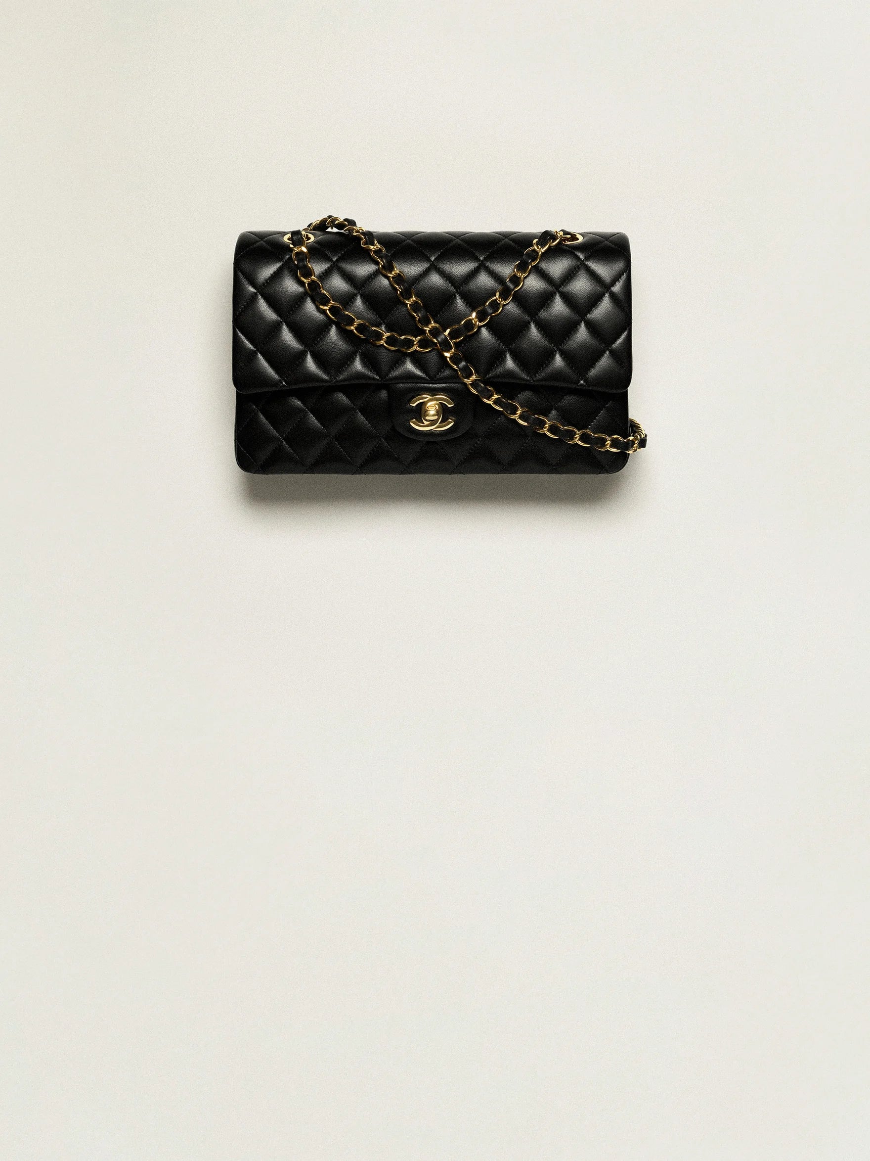 Chanel Classic Handbag
 
Grained Calfskin & Gold-Tone Metal 
Black
