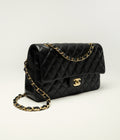 Chanel Classic Handbag
 
Grained Calfskin & Gold-Tone Metal 
Black