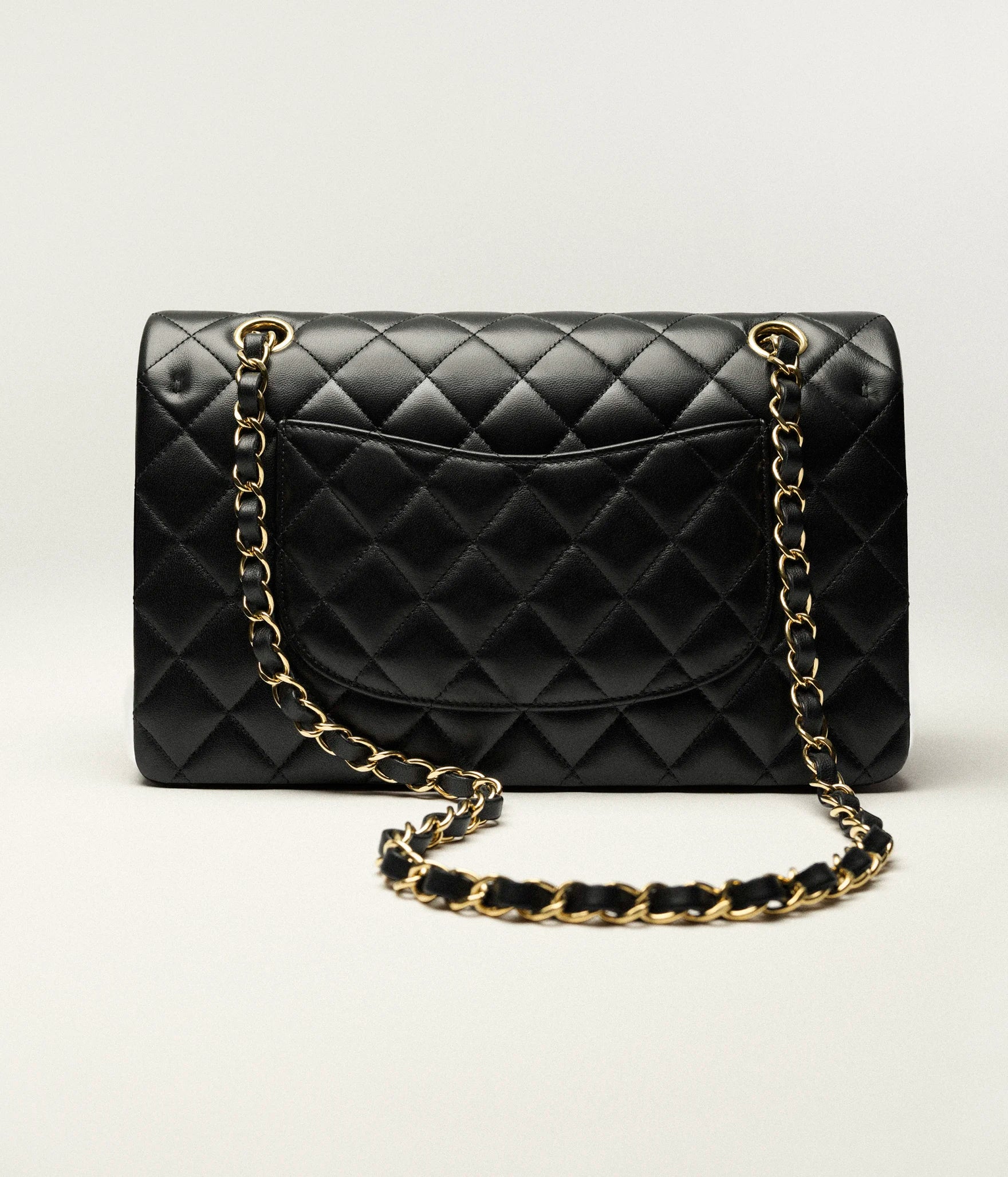 Chanel Classic Handbag
 
Grained Calfskin & Gold-Tone Metal 
Black